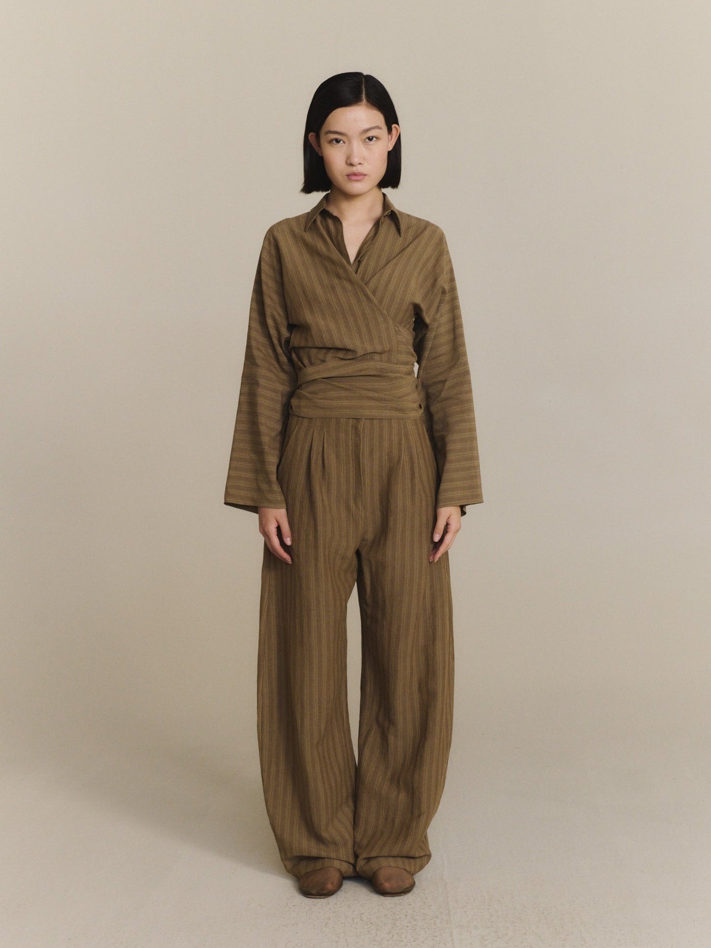 Brown pants, full body view