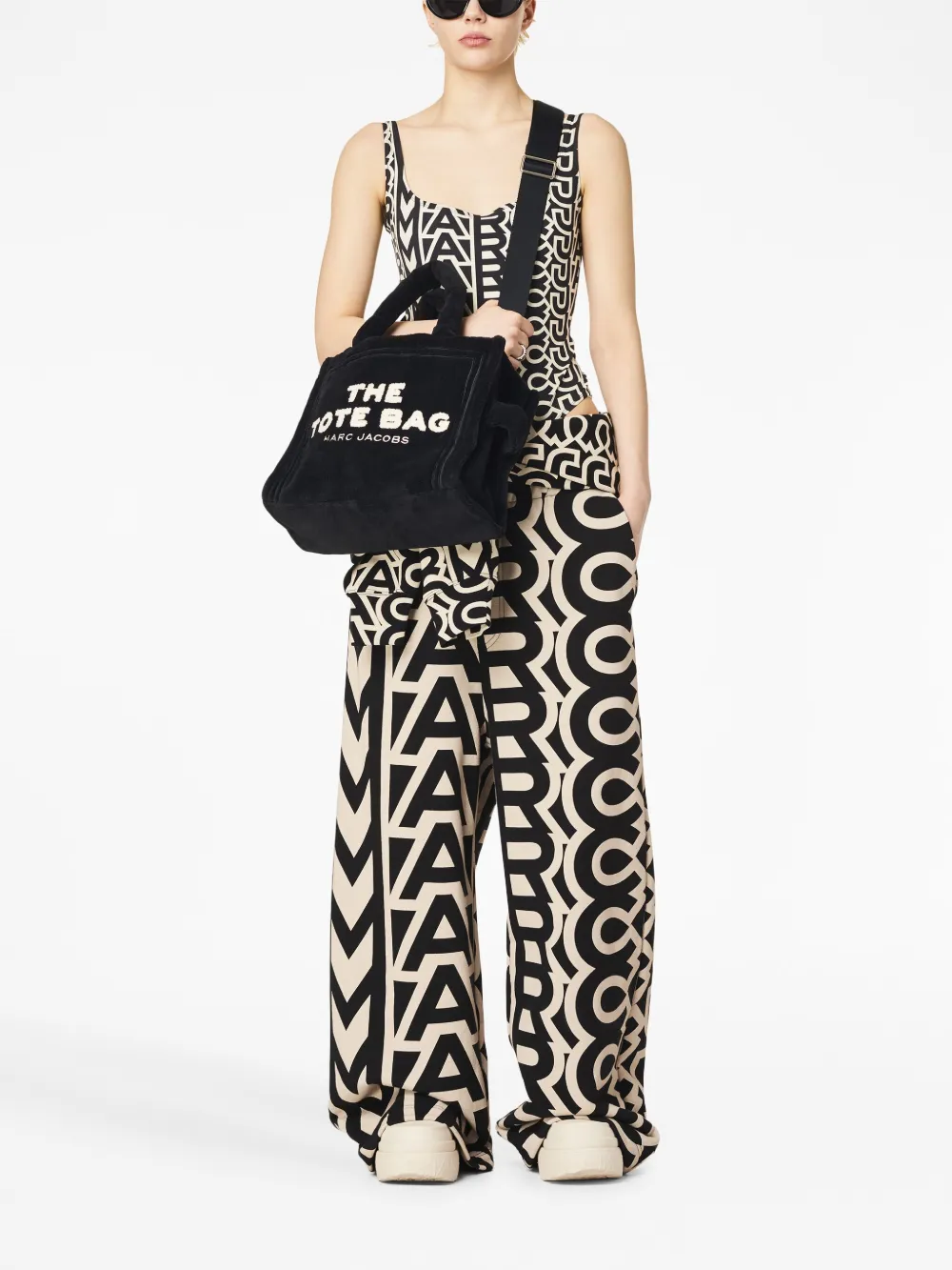 black bag worn by a person, showing the bag fit