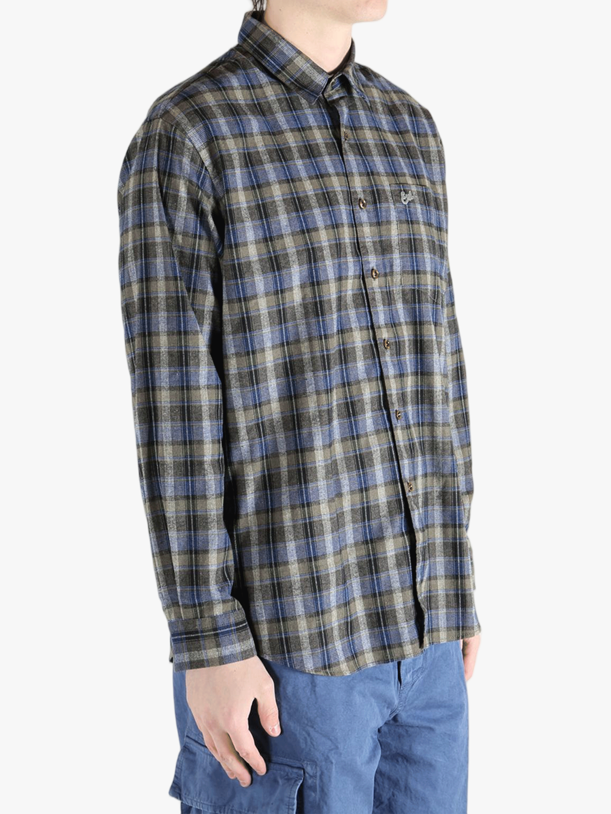 Grey shirts worn by a person, showing the shirts fit