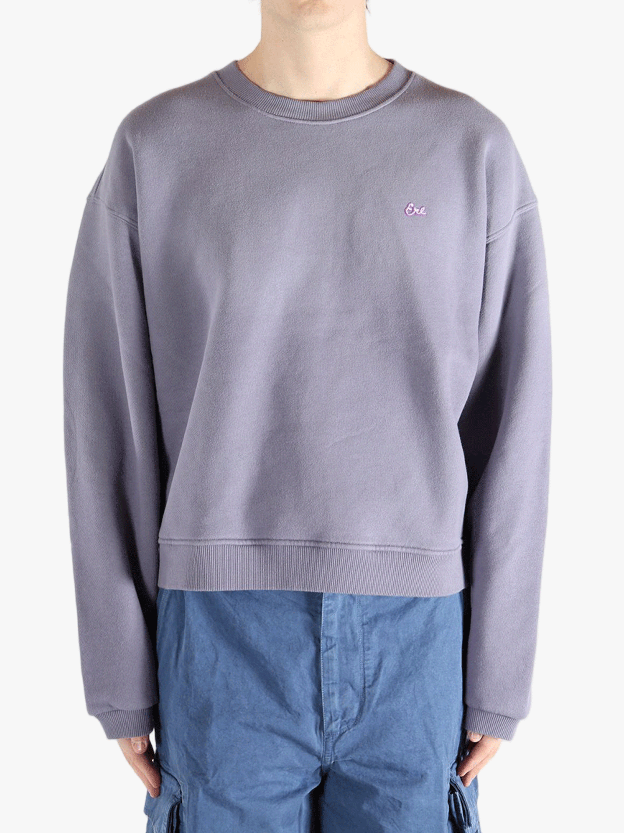 Purple top worn by a person, showing the top fit