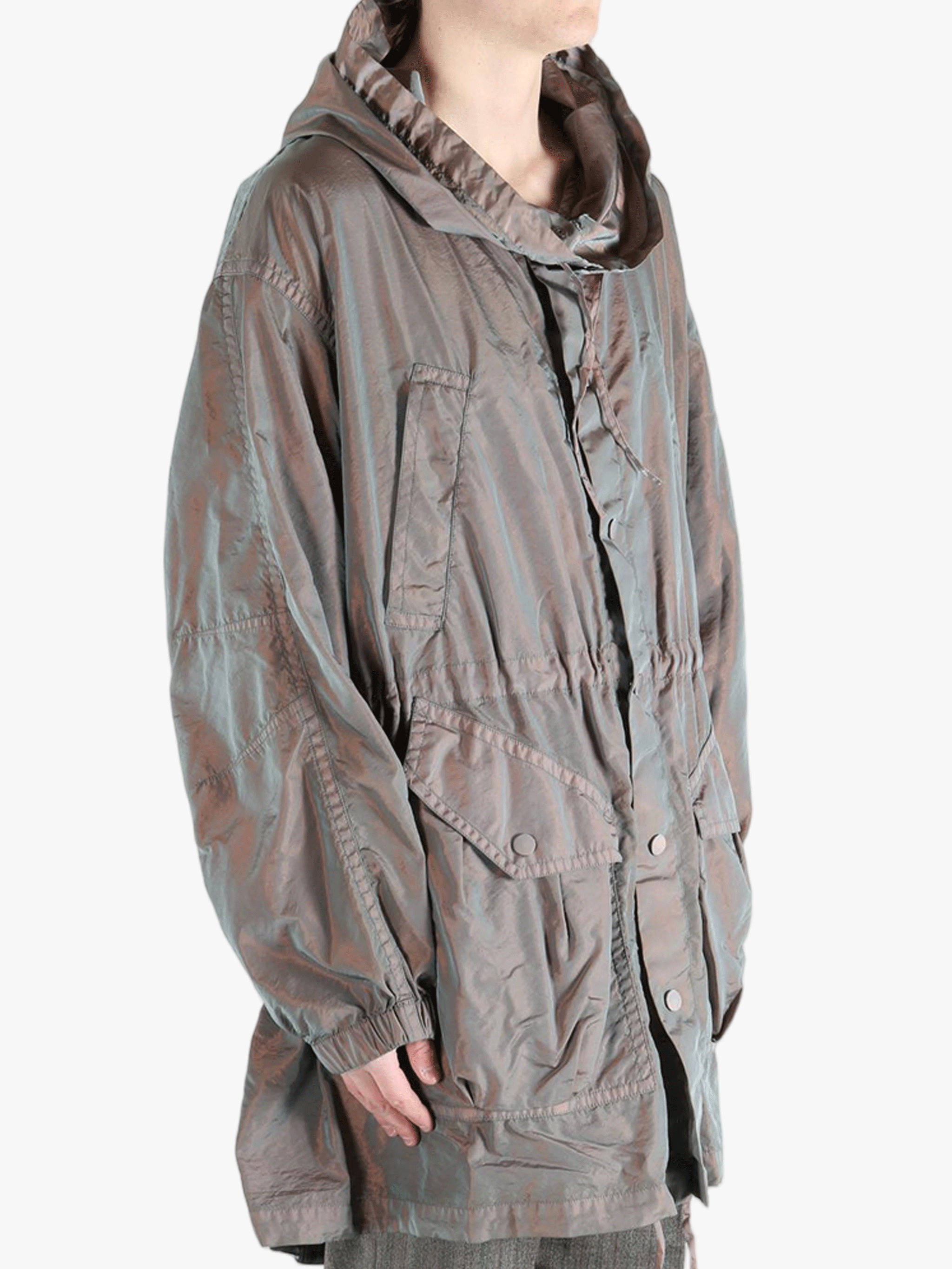 tan jackets-coats worn by a person, showing the jackets-coats fit