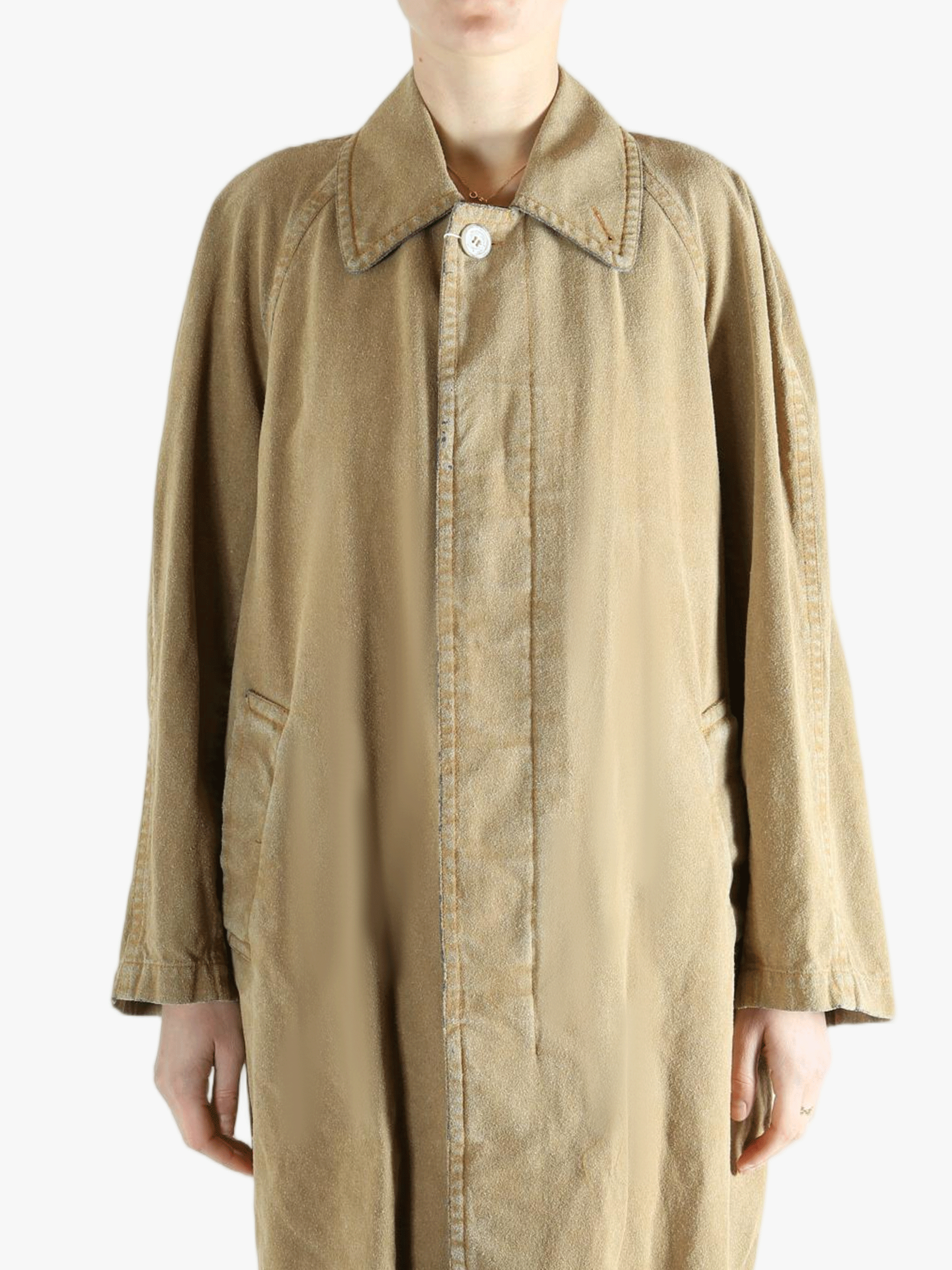 Tan jackets-coats worn by a person, showing the jackets-coats'fit