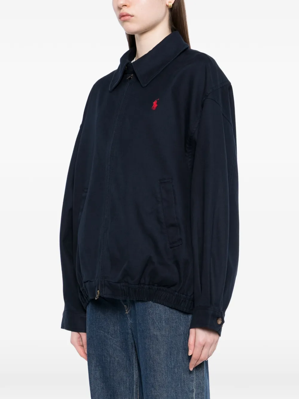 Navy jackets-coats worn by a person, showing the  jackets-coats'fit