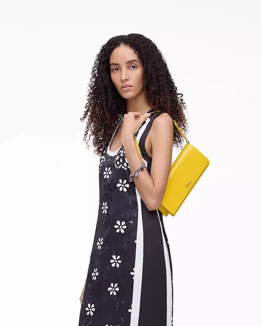 Yellow bag worn by a person, showing the bag fit