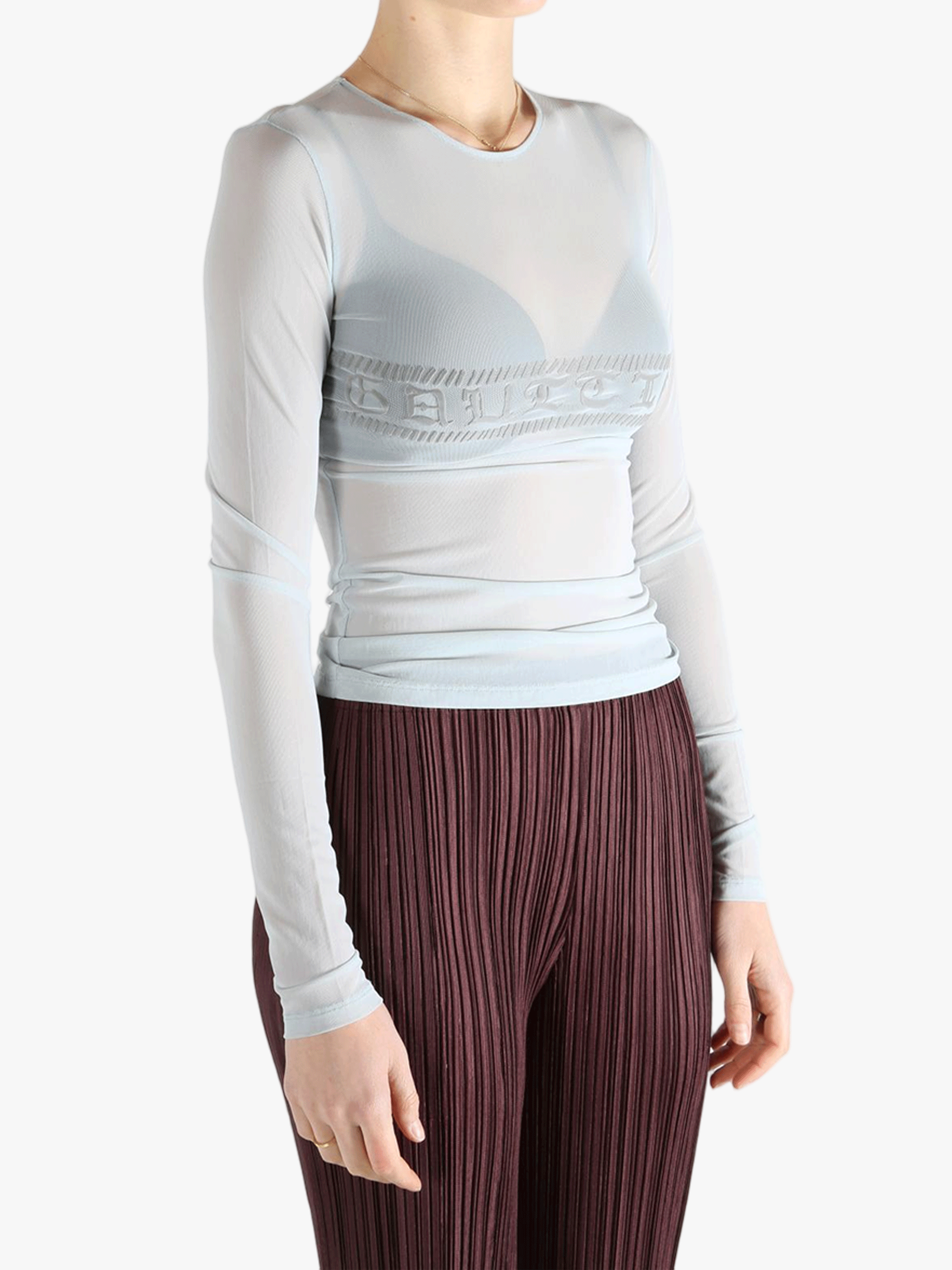 Blue top worn by a person, showing the top'fit