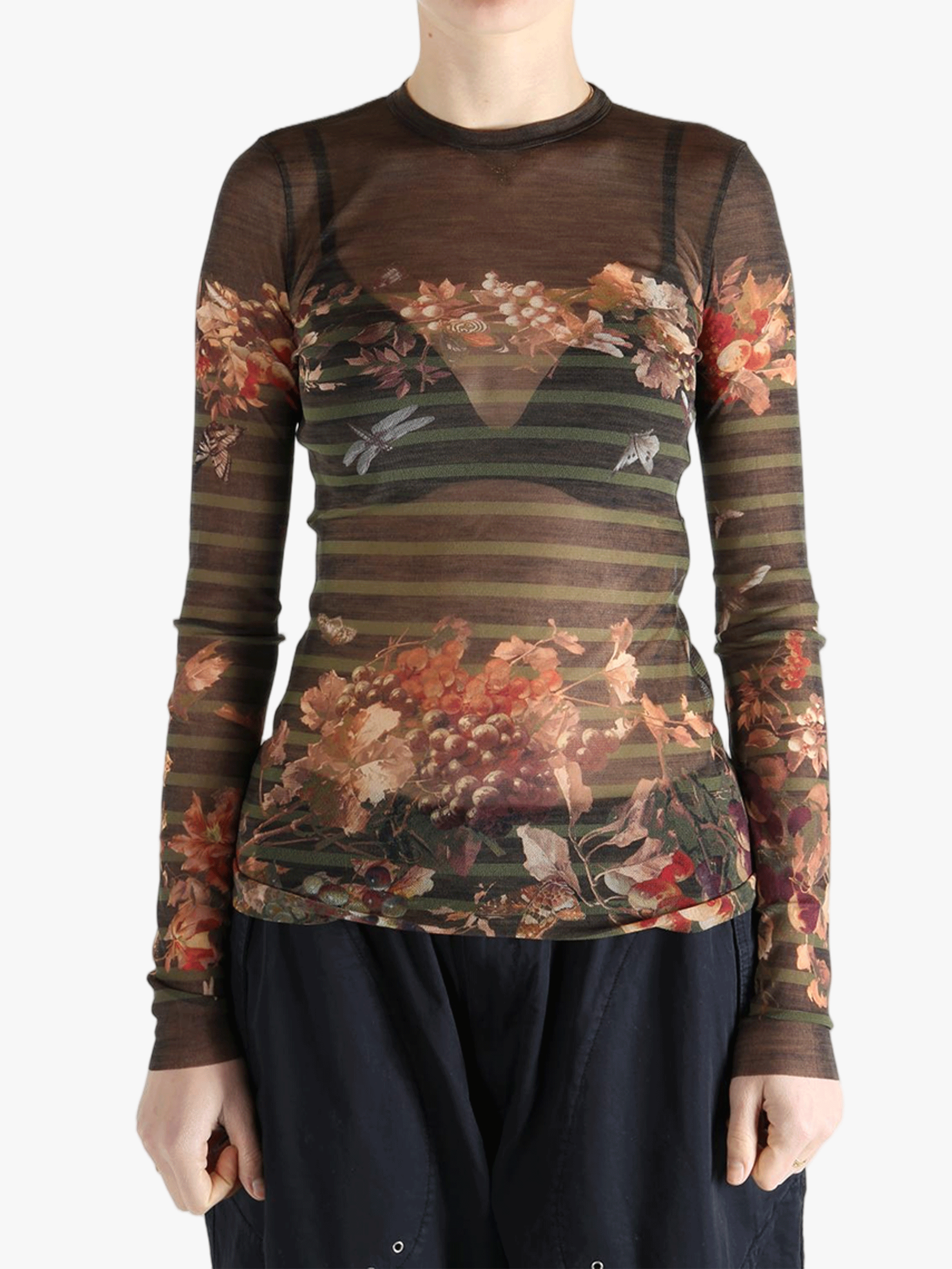 Brown top worn by a person, showing the top's fit