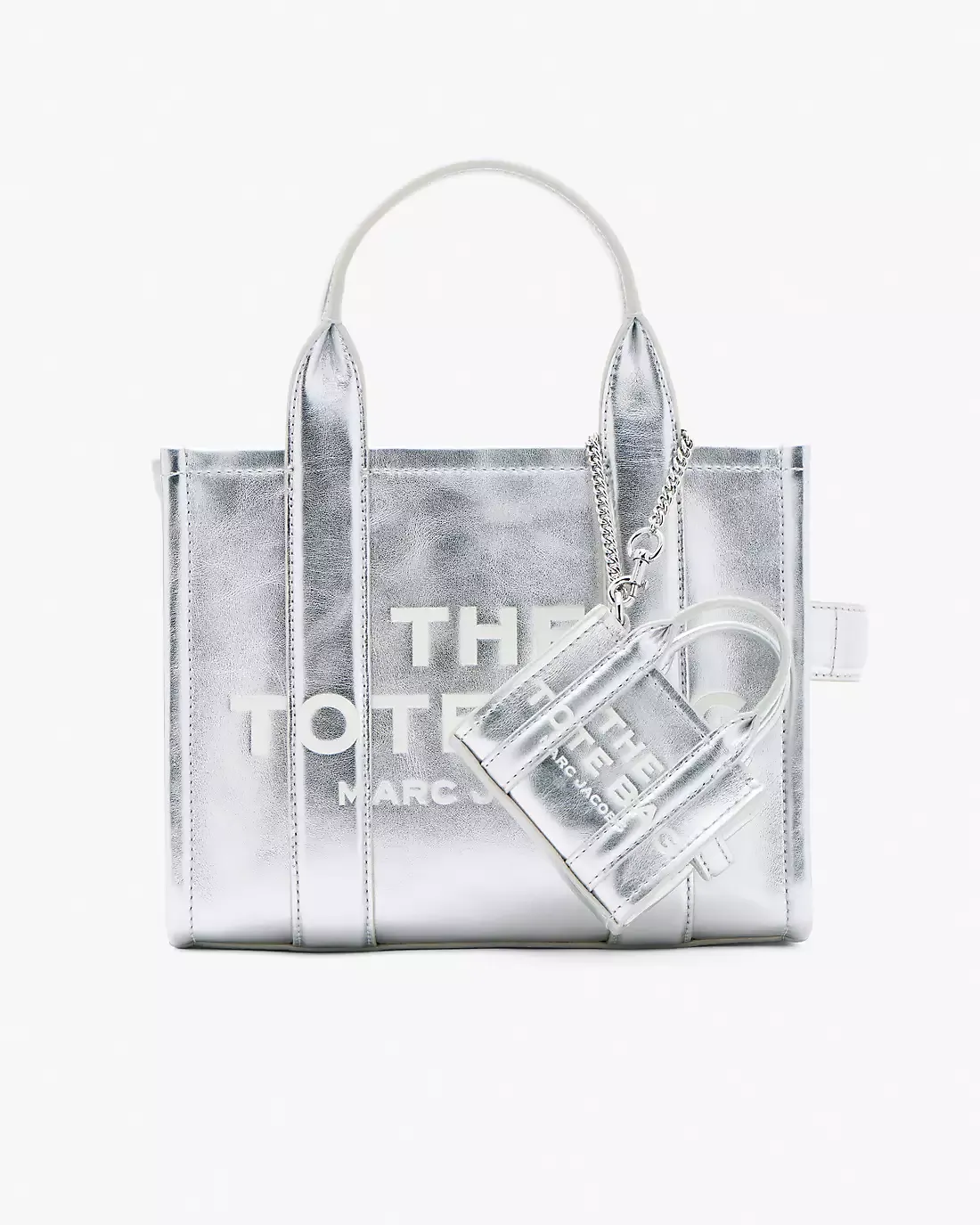 Grey charm bag worn by a bag, showing the charm bag fit 