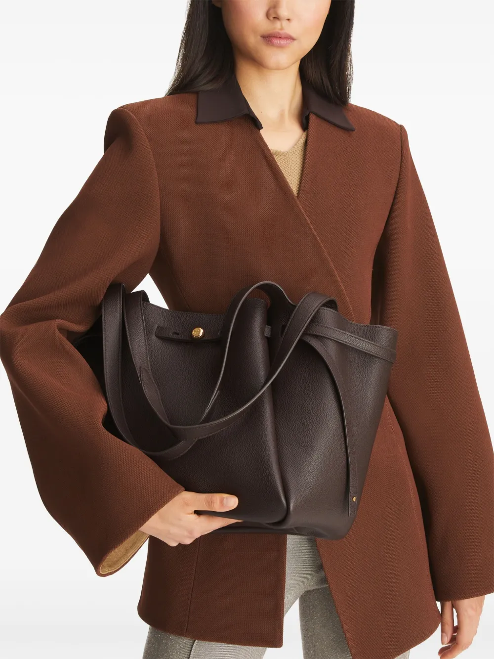 Brown bag worn by a person, showing the bag fit